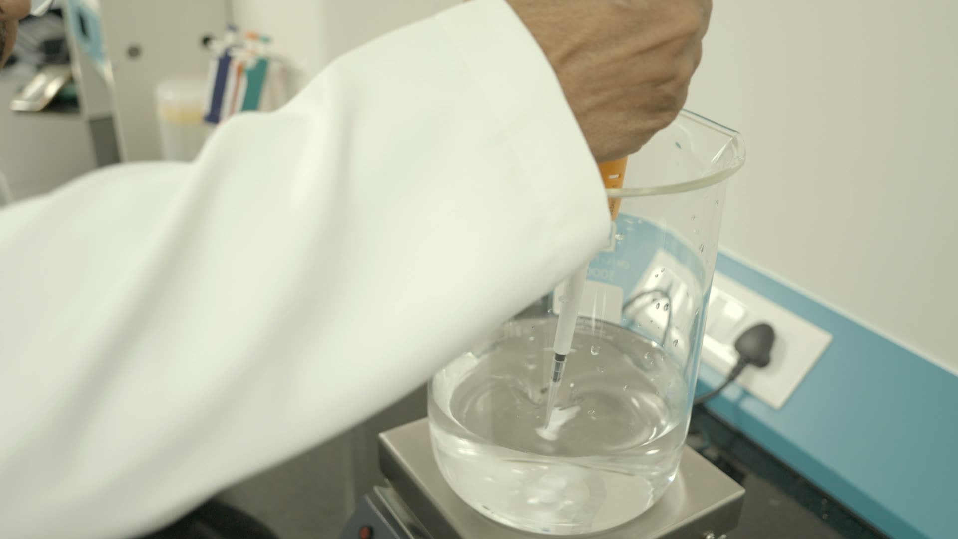 Scientist at the QC bench